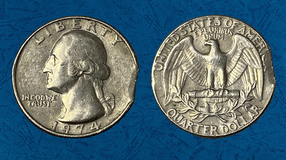 1974 quarter clipped planchet error showing curved bite missing from coin edge where blank was punched over previous hole